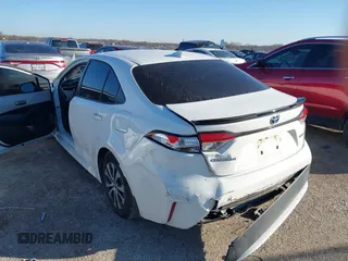 2022 Toyota Corolla Hybrid LE with VIN JTDEAMDE1NJ037740, listed as a IAAI auction lot 41482375 with 1 mi miles. Bid and sale history available at carsss.com. Image 3.