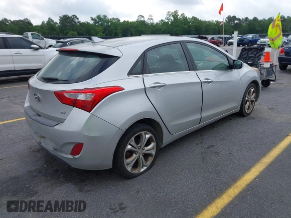 2013 Hyundai Elantra GT with VIN KMHD35LE7DU131627, listed as a IAAI auction lot 42093450 with 147,183 mi miles. Bid and sale history available at carsss.com. Image 4.