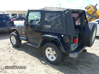 1998 Jeep Wrangler SE with VIN 1J4FY29P5WP793305, listed as a IAAI auction lot 42653372 with 190,047 mi miles and . Bid and sale history available at DreamBid. Image 3.
