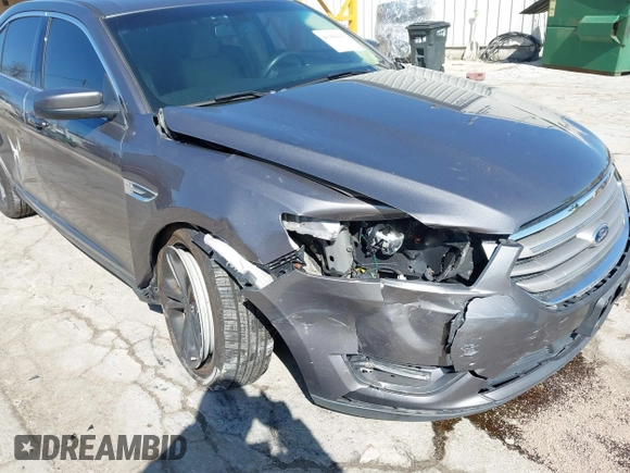 2013 Ford Taurus SEL z VIN 1FAHP2H83DG231000, wystawiony jako IAAI lot #41986420 z przebiegiem 200 390 mil mil oraz . Historia ofert i sprzedaży dostępna na DreamBid. Obrazek 6.