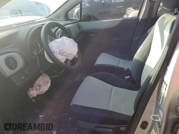 2012 Toyota Yaris L with VIN JTDKTUD30CD527660, listed as a Copart auction lot 42512405 with Not Provided miles and Salvage Title. Bid and sale history available at DreamBid. Image 7.