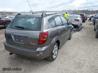 2007 Pontiac Vibe with VIN 5Y2SL65837Z414154, listed as a IAAI auction lot 42033597 with 121,728 mi miles. Bid and sale history available at carsss.com. Image 4.