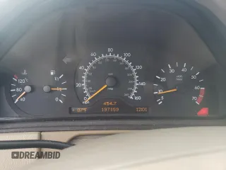 1999 Mercedes-Benz E-Class with VIN WDBJF65HXXA891437, listed as a Copart auction lot 73278334 with 197,159 mi miles and Salvage Title. Bid and sale history available at carsss.com. Image 9.