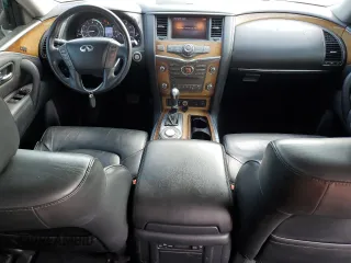 2012 Infiniti QX56 7-passenger with VIN JN8AZ2NF4C9515915, listed as a Copart auction lot 60258964 with 228,690 mi miles and Salvage Title. Bid and sale history available at carsss.com. Image 8.
