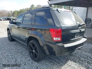 2005 Jeep Grand Cherokee Laredo with VIN 1J4GS48K05C511231, listed as a IAAI auction lot 41737924 with 179,411 mi miles. Bid and sale history available at carsss.com. Image 3.