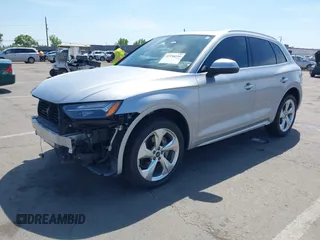 2021 Audi Q5 Premium Plus z VIN WA1BAAFY6M2130653, wystawiony jako IAAI lot #42138199 z przebiegiem 42 127 mil mil oraz . Historia ofert i sprzedaży dostępna na DreamBid. Obrazek 2.