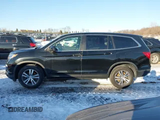 2016 Honda Pilot EX-L with VIN 5FNYF6H7XGB115951, listed as a IAAI auction lot 41642756 with 101,688 mi miles. Bid and sale history available at carsss.com. Image 14.