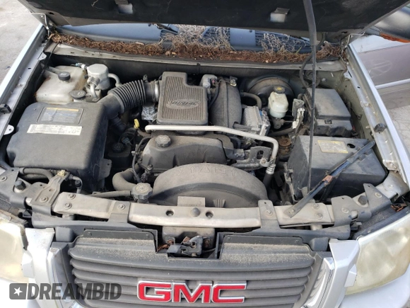 2005 GMC Envoy SLT with VIN 1GKDS13S752319457, listed as a Copart auction lot 74073633 with 181,969 mi miles and Clean Title. Bid and sale history available at carsss.com. Image 12.