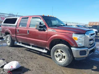2015 Ford Super Duty F-250 SRW Lariat with VIN 1FT7W2B61FEB63326, listed as a IAAI auction lot 41726728 with 128,966 mi miles. Bid and sale history available at carsss.com. Image 1.