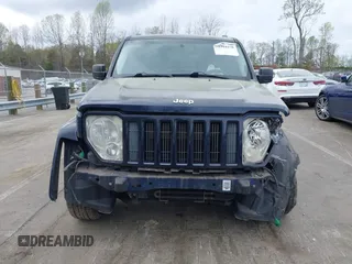 2012 Jeep Liberty Sport with VIN 1C4PJMAK2CW210975, listed as a IAAI auction lot 41904478 with 136,462 mi miles. Bid and sale history available at carsss.com. Image 13.