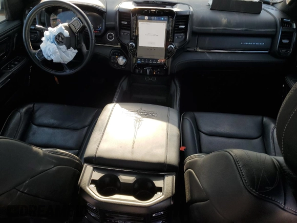 2023 Ram 1500 Limited with VIN 1C6SRFHT5PN666744, listed as a Copart auction lot 48538235 with 54,446 mi miles and Salvage title. Bid and sale history available at DreamBid. Image 8.