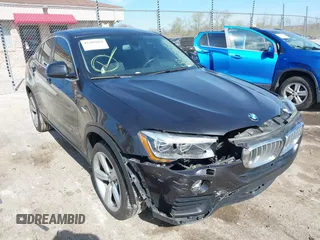 2017 BMW X4 xDrive28i with VIN 5UXXW3C36H0T79679, listed as a IAAI auction lot 42203662 with 137,863 mi miles and . Bid and sale history available at DreamBid. Image 6.