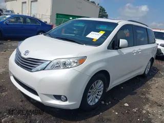 2015 Toyota Sienna XLE with VIN 5TDYK3DC5FS613045, listed as a IAAI auction lot 42276147 with 108,271 mi miles and . Bid and sale history available at DreamBid. Image 2.