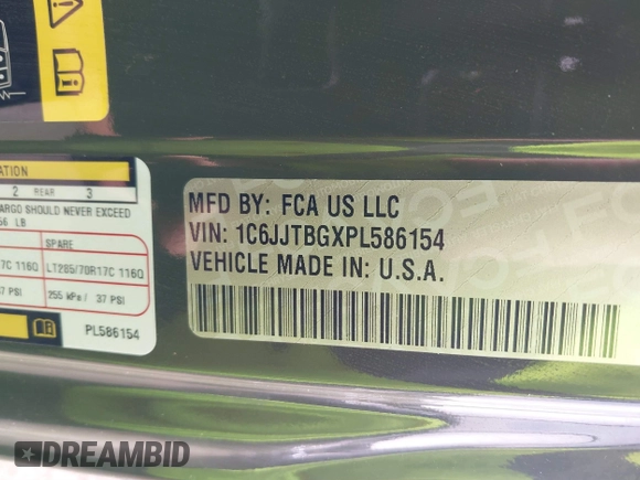 2023 Jeep Gladiator Rubicon with VIN 1C6JJTBGXPL586154, listed as a IAAI auction lot 41370352 with 11,207 mi miles and . Bid and sale history available at DreamBid. Image 9.