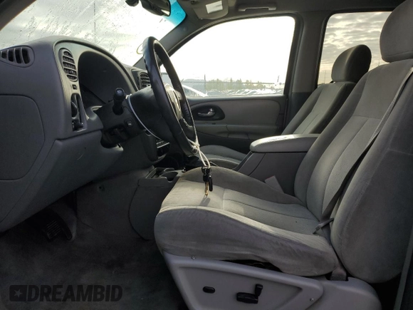 2006 Chevrolet TrailBlazer LS with VIN 1GNDT13S962174360, listed as a Copart auction lot 51374335 with 211,184 mi miles and Salvage Title. Bid and sale history available at DreamBid. Image 7.