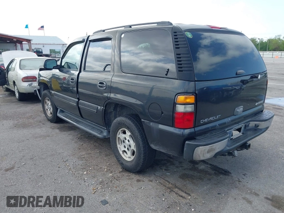 2005 Chevrolet Tahoe LS with VIN 1GNEC13V35R263104, listed as a IAAI auction lot 41918482 with 208,520 mi miles and . Bid and sale history available at DreamBid. Image 3.
