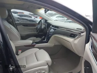 2013 Cadillac XTS Platinum z VIN 2G61V5S37D9194227, wystawiony jako IAAI lot #41510449 z przebiegiem 114 243 mil mil oraz . Historia ofert i sprzedaży dostępna na DreamBid. Obrazek 5.