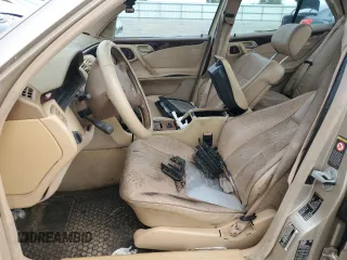 2001 Mercedes-Benz E-Class with VIN WDBJF70JX1B194075, listed as a Copart auction lot 70482944 with 218,319 mi miles and Salvage Title. Bid and sale history available at carsss.com. Image 7.
