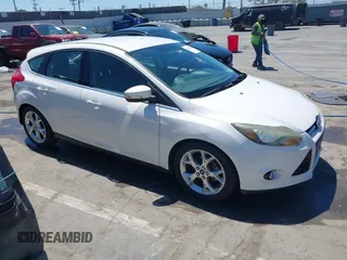 2014 Ford Focus Titanium with VIN 1FADP3N27EL330366, listed as a IAAI auction lot 42719377 with 97,009 mi miles and . Bid and sale history available at DreamBid. Image 1.
