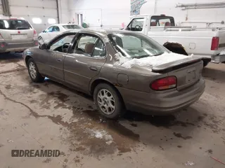 2002 Oldsmobile Intrigue GX z VIN 1G3WH52H12F206561, wystawiony jako IAAI lot #41585986 z przebiegiem 172 331 mil mil oraz . Historia ofert i sprzedaży dostępna na DreamBid. Obrazek 3.