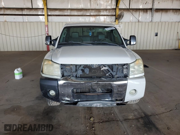 2004 Nissan Titan SE with VIN 1N6AA06B84N577326, listed as a Copart auction lot 59724355 with 179,549 mi miles and Salvage title. Bid and sale history available at DreamBid. Image 5.