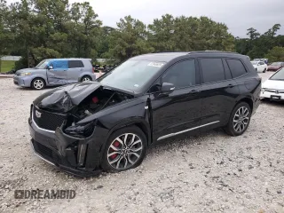 2023 Cadillac XT6 AWD Sport z VIN 1GYKPGRS6PZ126039, wystawiony jako Copart lot #55948605 z przebiegiem 39 966 mil mil oraz Szkoda całkowita • Salvage title. Historia ofert i sprzedaży dostępna na DreamBid. Obrazek 1.
