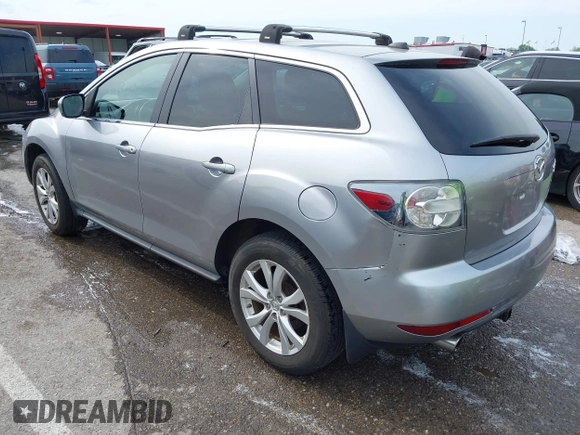 2011 Mazda CX-7 S Touring z VIN JM3ER4C30B0393887, wystawiony jako IAAI lot #42093166 z przebiegiem 123 920 mil mil oraz . Historia ofert i sprzedaży dostępna na DreamBid. Obrazek 3.