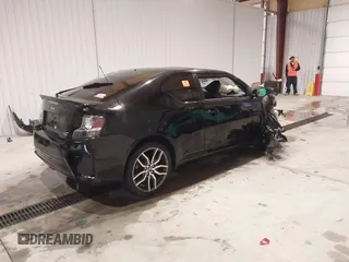 2014 Scion tC z VIN JTKJF5C74E3086243, wystawiony jako IAAI lot #40983287 z przebiegiem Nie podano mil oraz . Historia ofert i sprzedaży dostępna na DreamBid. Obrazek 4.