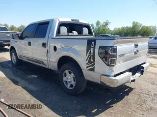 2014 Ford F-150 XL with VIN 1FTFW1CT3EKD12216, listed as a IAAI auction lot 42110775 with 140,673 mi miles. Bid and sale history available at carsss.com. Image 3.