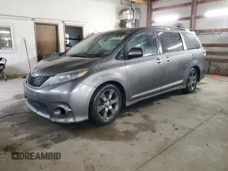 2015 Toyota Sienna SE with VIN 5TDXK3DC4FS619737, listed as a Copart auction lot 42935975 with 221,072 mi miles and Salvage title. Bid and sale history available at DreamBid. Image 1.
