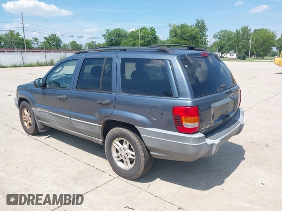 2002 Jeep Grand Cherokee Laredo with VIN 1J4GW48SX2C206755, listed as a IAAI auction lot 42631502 with 155,752 mi miles and . Bid and sale history available at DreamBid. Image 3.