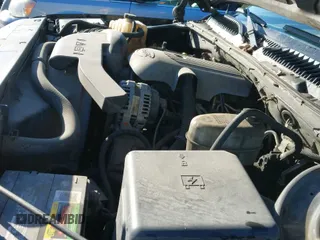 2004 Chevrolet Suburban LS z VIN 1GNFK16Z34J220935, wystawiony jako IAAI lot #41513589 z przebiegiem 313 078 mil mil oraz . Historia ofert i sprzedaży dostępna na DreamBid. Obrazek 19.