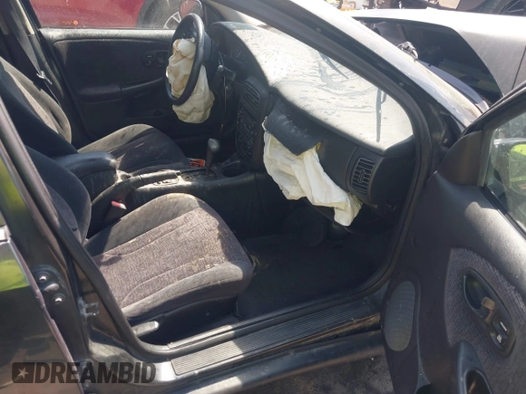 2001 Saturn SL with VIN 1G8ZK527X1Z238857, listed as a IAAI auction lot 42460370 with 76,231 mi miles and . Bid and sale history available at DreamBid. Image 5.