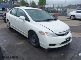 2010 Honda Civic Sdn LX with VIN 2HGFA1F58AH531042, listed as a IAAI auction lot 41933448 with 253,699 mi miles. Bid and sale history available at carsss.com. Image 1.