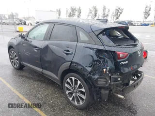 2019 Mazda CX-3 Touring with VIN JM1DKDC79K0424436, listed as a IAAI auction lot 41579280 with 76,989 mi miles. Bid and sale history available at carsss.com. Image 3.