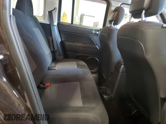 2014 Jeep Patriot Latitude z VIN 1C4NJRFB7ED630436, wystawiony jako Copart lot #58370565 z przebiegiem 148 275 mil mil oraz Nie do naprawy • Non repairable. Historia ofert i sprzedaży dostępna na DreamBid. Obrazek 11.