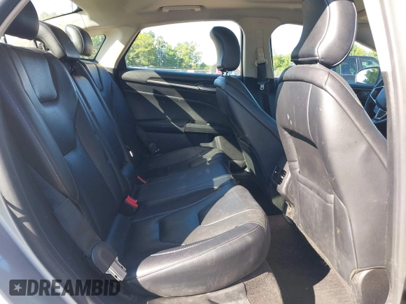 2019 Ford Fusion Titanium with VIN 3FA6P0RUXKR141565, listed as a IAAI auction lot 42323999 with 206,397 mi miles and . Bid and sale history available at DreamBid. Image 8.