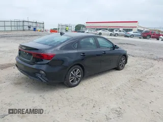 2023 Kia Forte LXS with VIN 3KPF24AD1PE594919, listed as a IAAI auction lot 42158476 with 34,719 mi miles and . Bid and sale history available at DreamBid. Image 4.