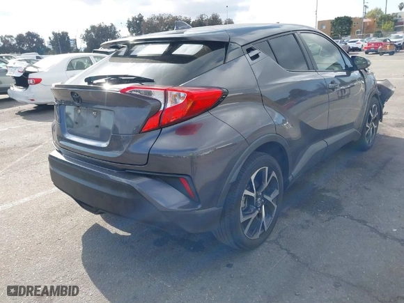 2020 Toyota C-HR LE with VIN JTNKHMBX6L1081650, listed as a IAAI auction lot 41435928 with 62,256 mi miles. Bid and sale history available at carsss.com. Image 4.