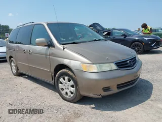 2004 Honda Odyssey EX-L with VIN 5FNRL18914B070864, listed as a IAAI auction lot 42646838 with 222,046 mi miles and . Bid and sale history available at DreamBid. Image 1.