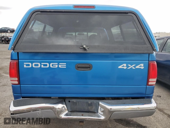 1999 Dodge Dakota SLT with VIN 1B7GG22Y7XS166815, listed as a Copart auction lot 48402125 with 176,458 mi miles and Salvage Title. Bid and sale history available at DreamBid. Image 6.