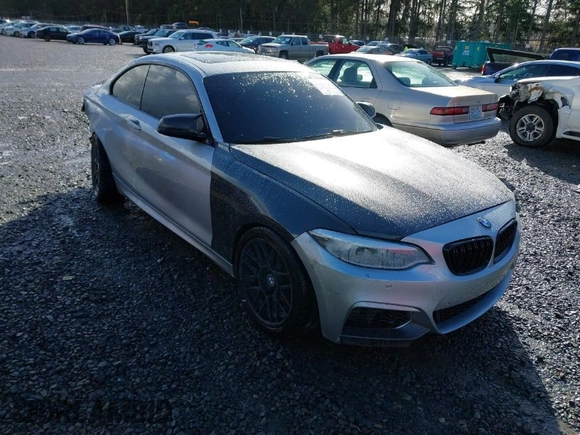 2015 BMW 2 Series 228i with VIN WBA1F5C55FV343662, listed as a IAAI auction lot 41729309 with 90,770 mi miles. Bid and sale history available at carsss.com. Image 1.