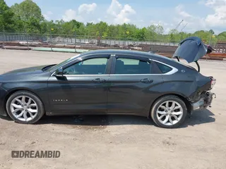 2014 Chevrolet Impala LT with VIN 2G1125S36E9156519, listed as a IAAI auction lot 42145424 with 97,755 mi miles and . Bid and sale history available at DreamBid. Image 14.