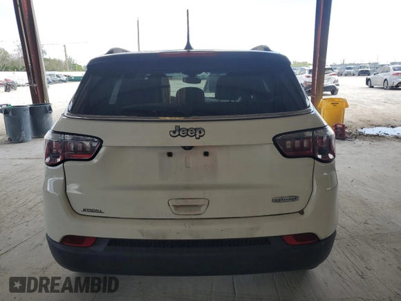 2019 Jeep Compass Altitude with VIN 3C4NJCBB0KT637477, listed as a Copart auction lot 57751005 with 94,316 mi miles and Clean title. Bid and sale history available at DreamBid. Image 6.