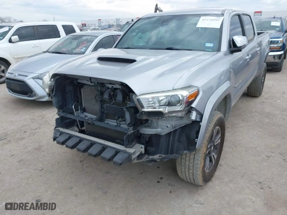 2019 Toyota Tacoma 4WD SR5 with VIN 3TMDZ5BN9KM061604, listed as a IAAI auction lot 41274995 with 87,834 mi miles. Bid and sale history available at carsss.com. Image 6.