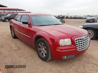 2010 Chrysler 300 Touring with VIN 2C3CA5CV3AH138812, listed as a IAAI auction lot 41870285 with 165,788 mi miles. Bid and sale history available at carsss.com. Image 1.