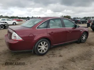 2008 Ford Taurus SEL with VIN 1FAHP24WX8G159335, listed as a Copart auction lot 74106694 with 187,710 mi miles and Salvage Title. Bid and sale history available at carsss.com. Image 3.