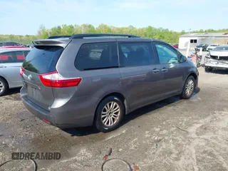2015 Toyota Sienna XLE with VIN 5TDYK3DC9FS685768, listed as a IAAI auction lot 42062942 with 132,242 mi miles. Bid and sale history available at carsss.com. Image 4.