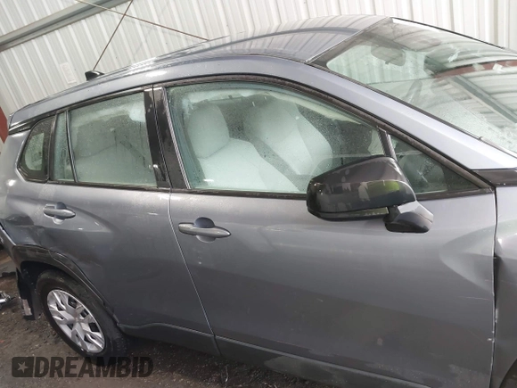2022 Toyota Corolla Cross L with VIN 7MUAAAAG9NV034659, listed as a IAAI auction lot 42125356 with 14,631 mi miles and . Bid and sale history available at DreamBid. Image 13.