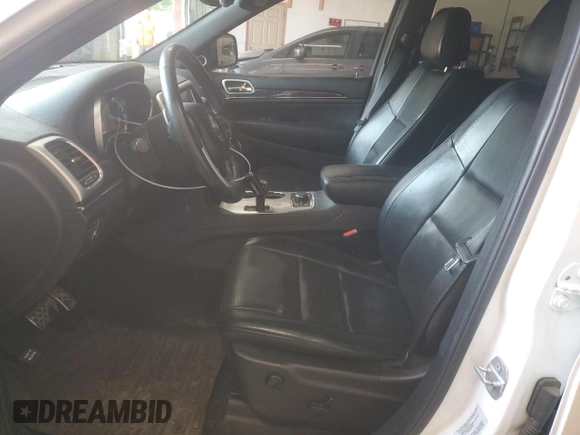 2015 Jeep Grand Cherokee High Altitude with VIN 1C4RJFCG8FC198172, listed as a Copart auction lot 60542165 with 137,313 mi miles and Salvage title. Bid and sale history available at DreamBid. Image 7.